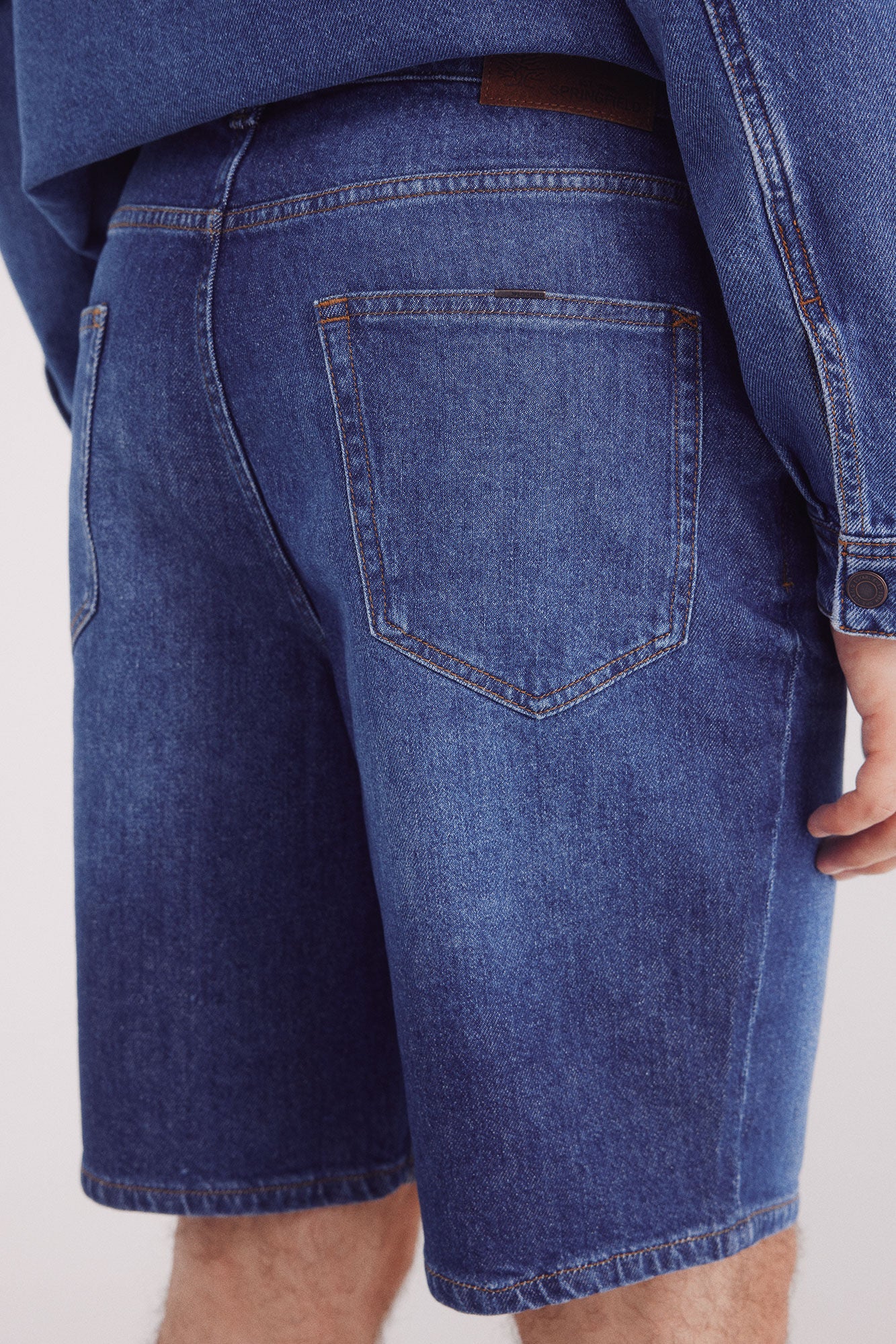 Regular fit medium dark wash denim Bermuda shorts