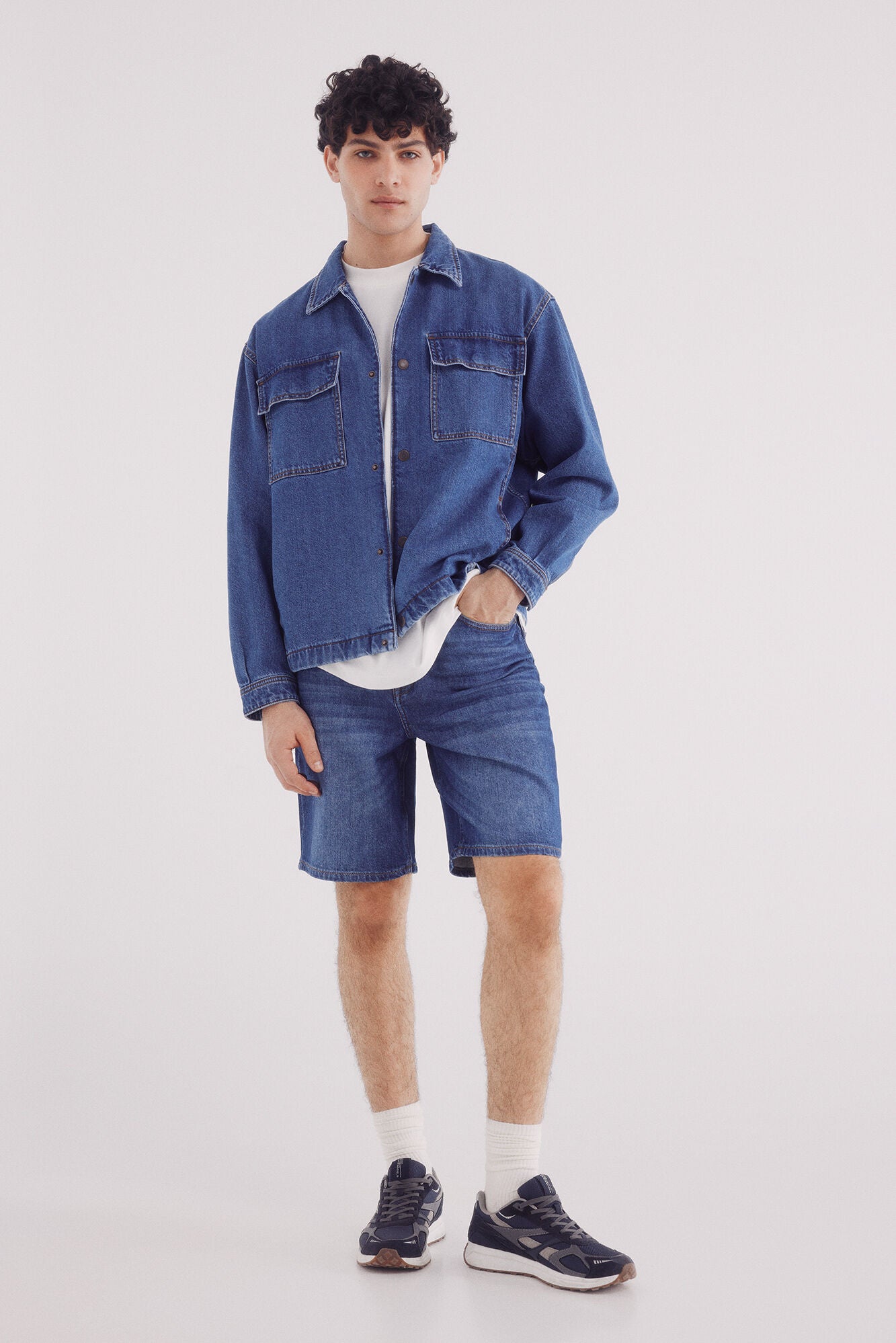 Regular fit medium dark wash denim Bermuda shorts