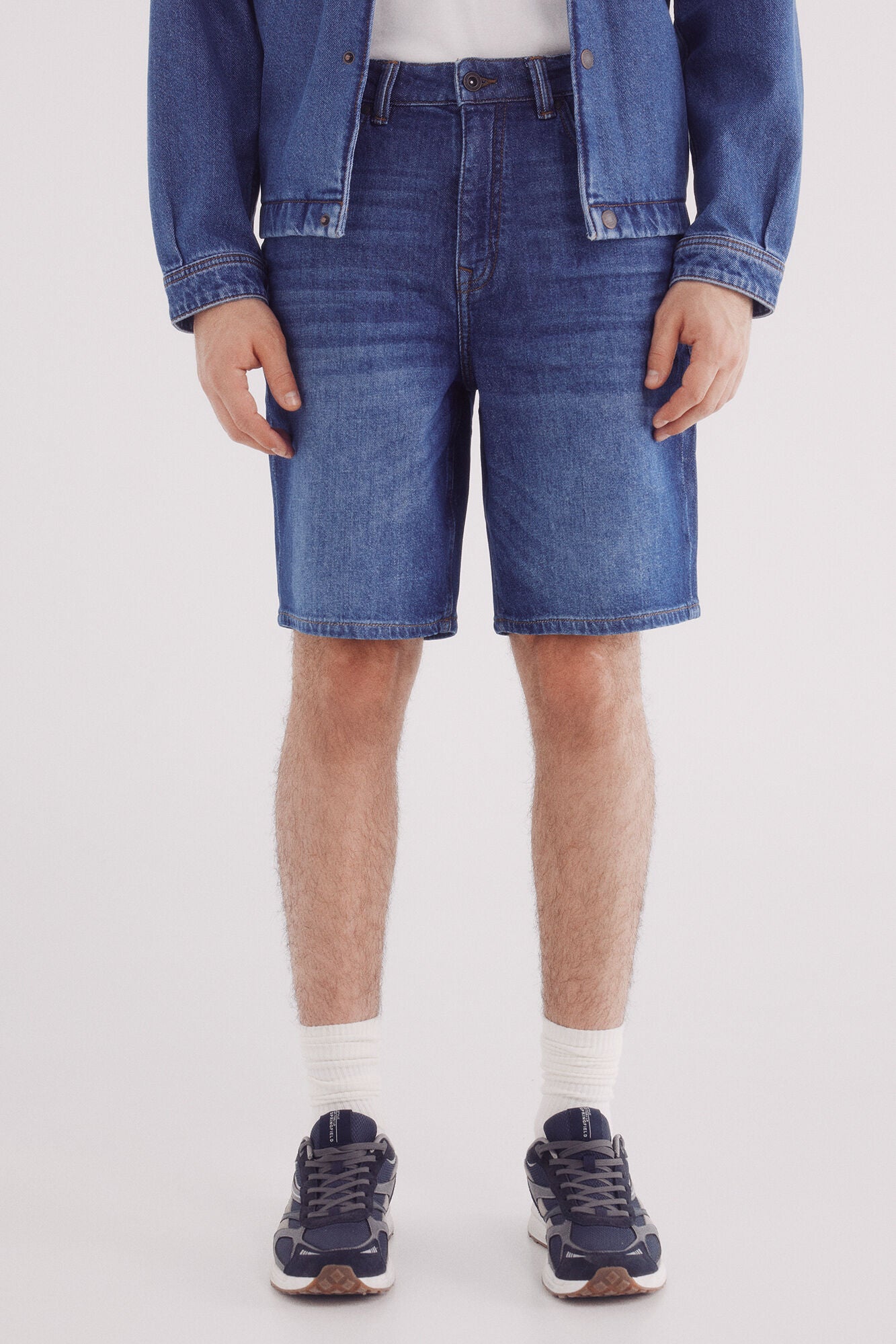 Regular fit medium dark wash denim Bermuda shorts