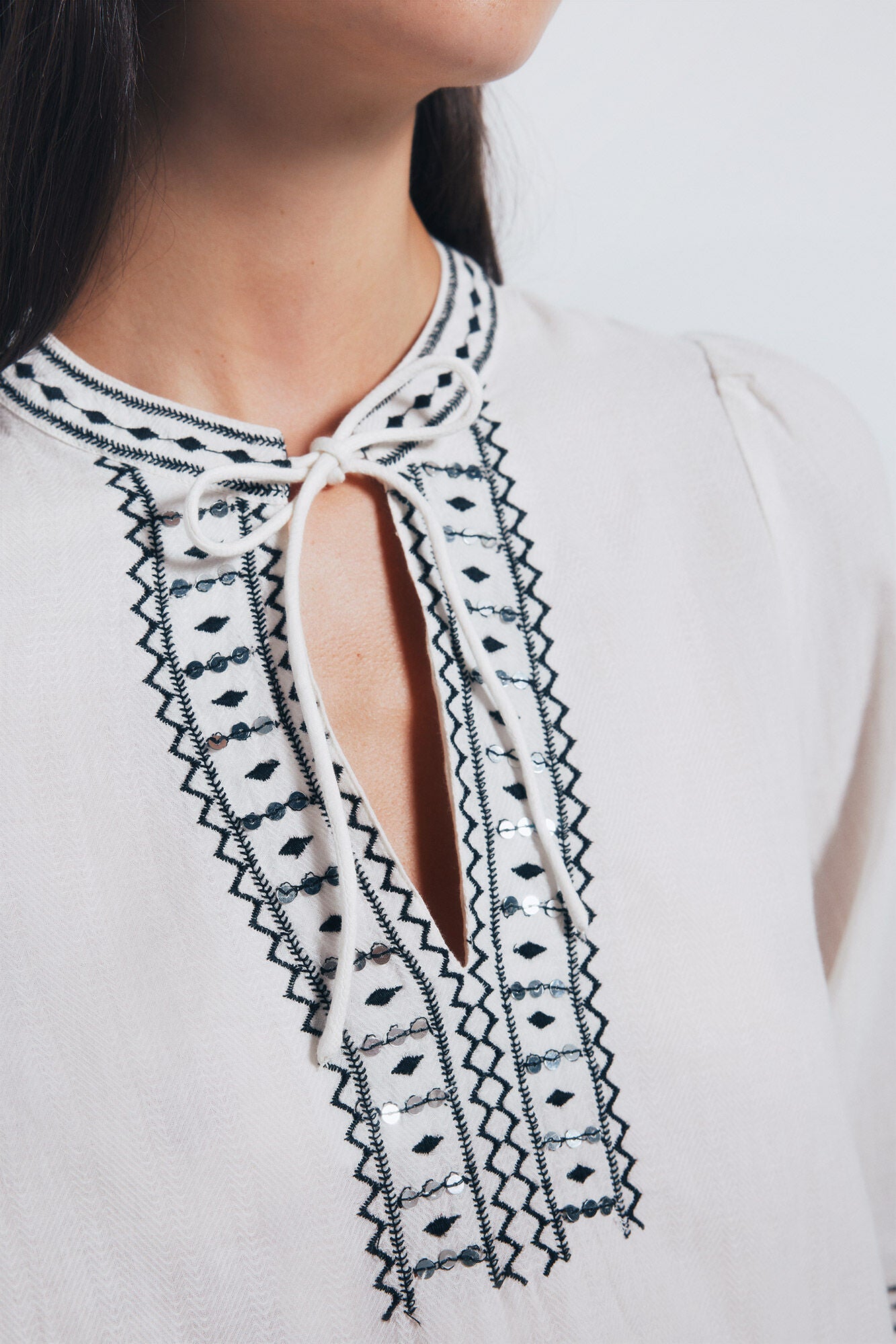 Boho blouse with sequin embroidery