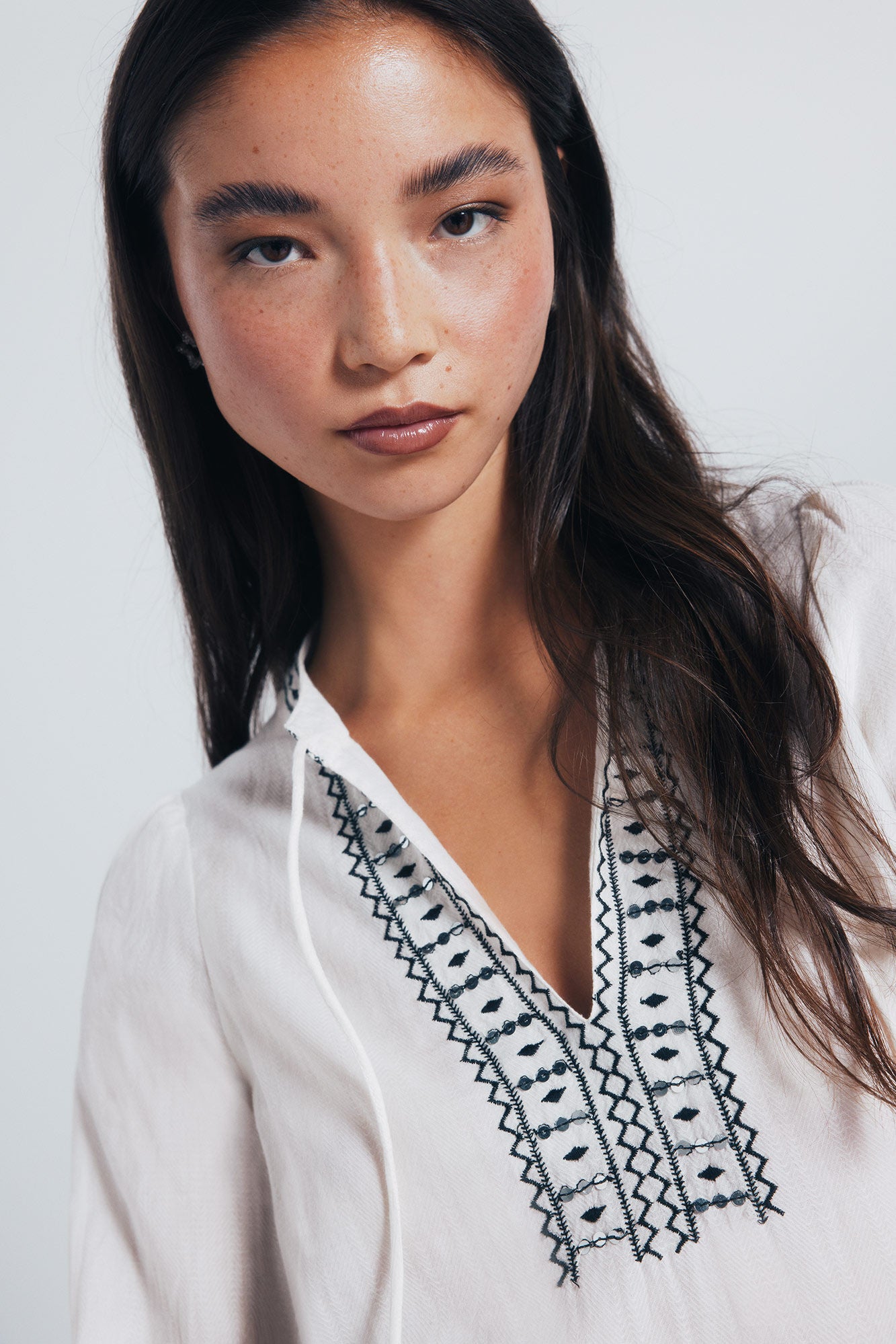 Boho blouse with sequin embroidery