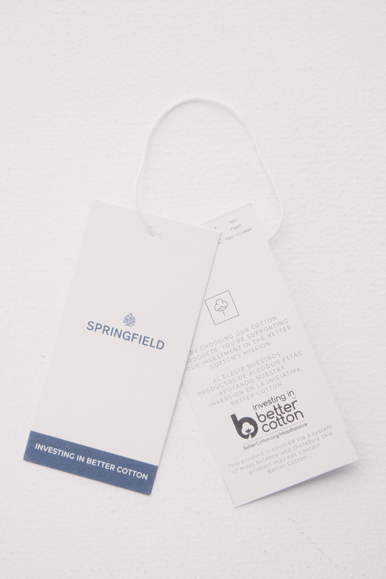 Plain t-shirt with turned-up sleeves and shoulder buttons