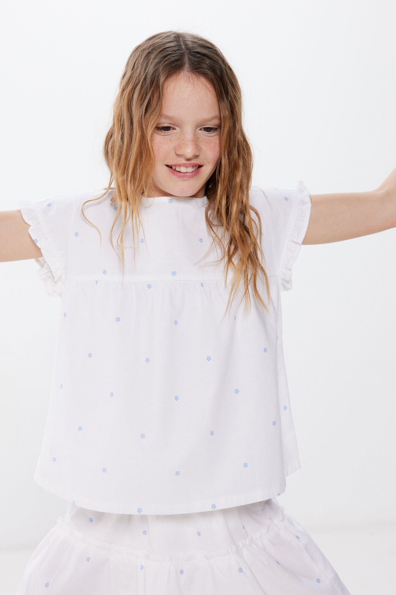 Girls' blue floral blouse