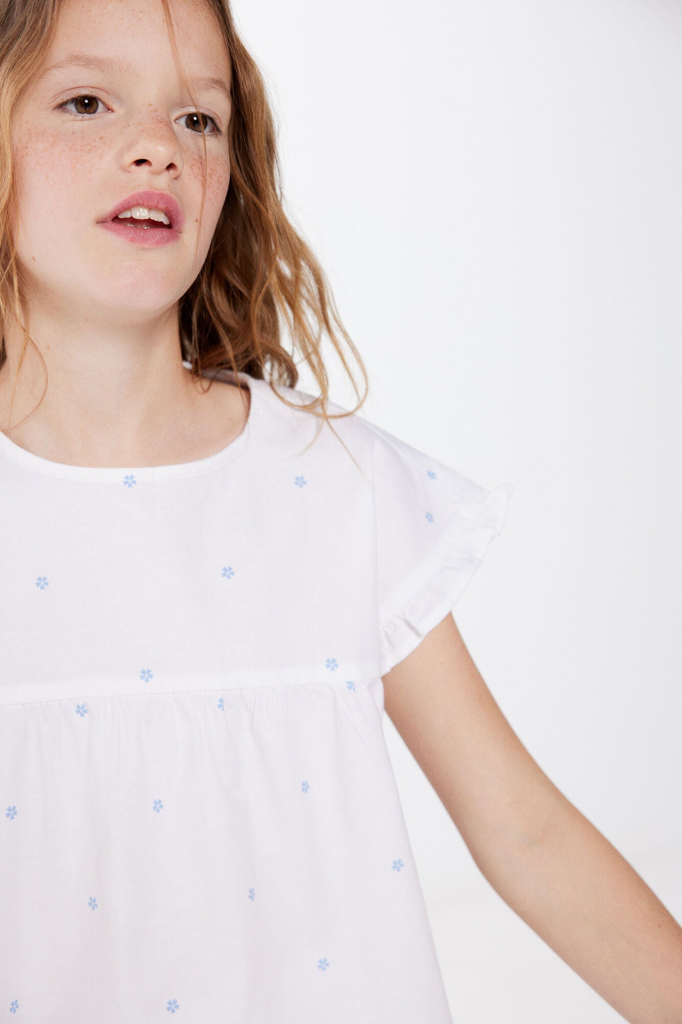 Girls' blue floral blouse