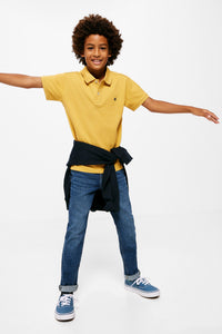 Boy's essential piqué polo shirt