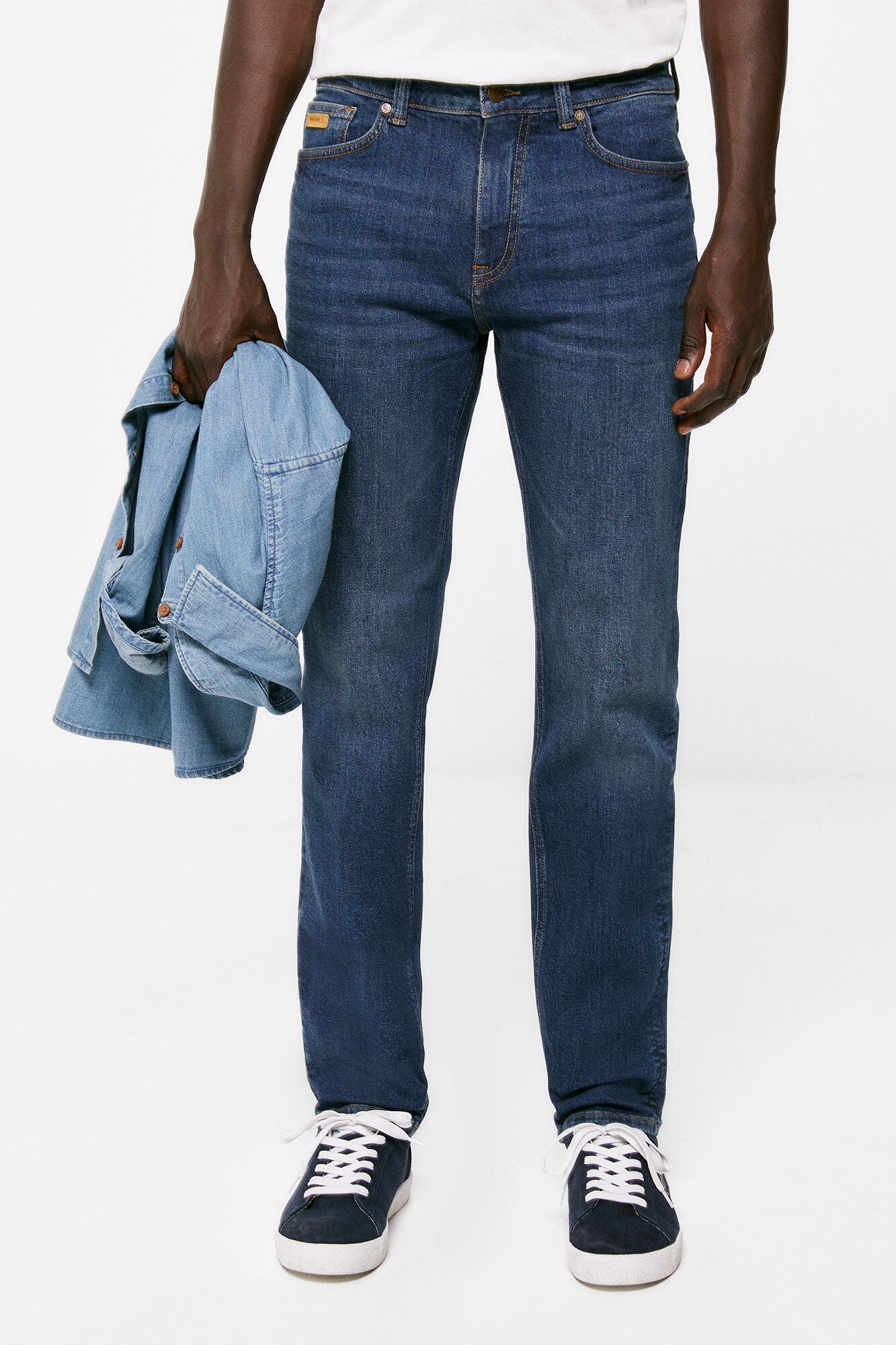 Lightweight distressed dark wash slim fit jeans