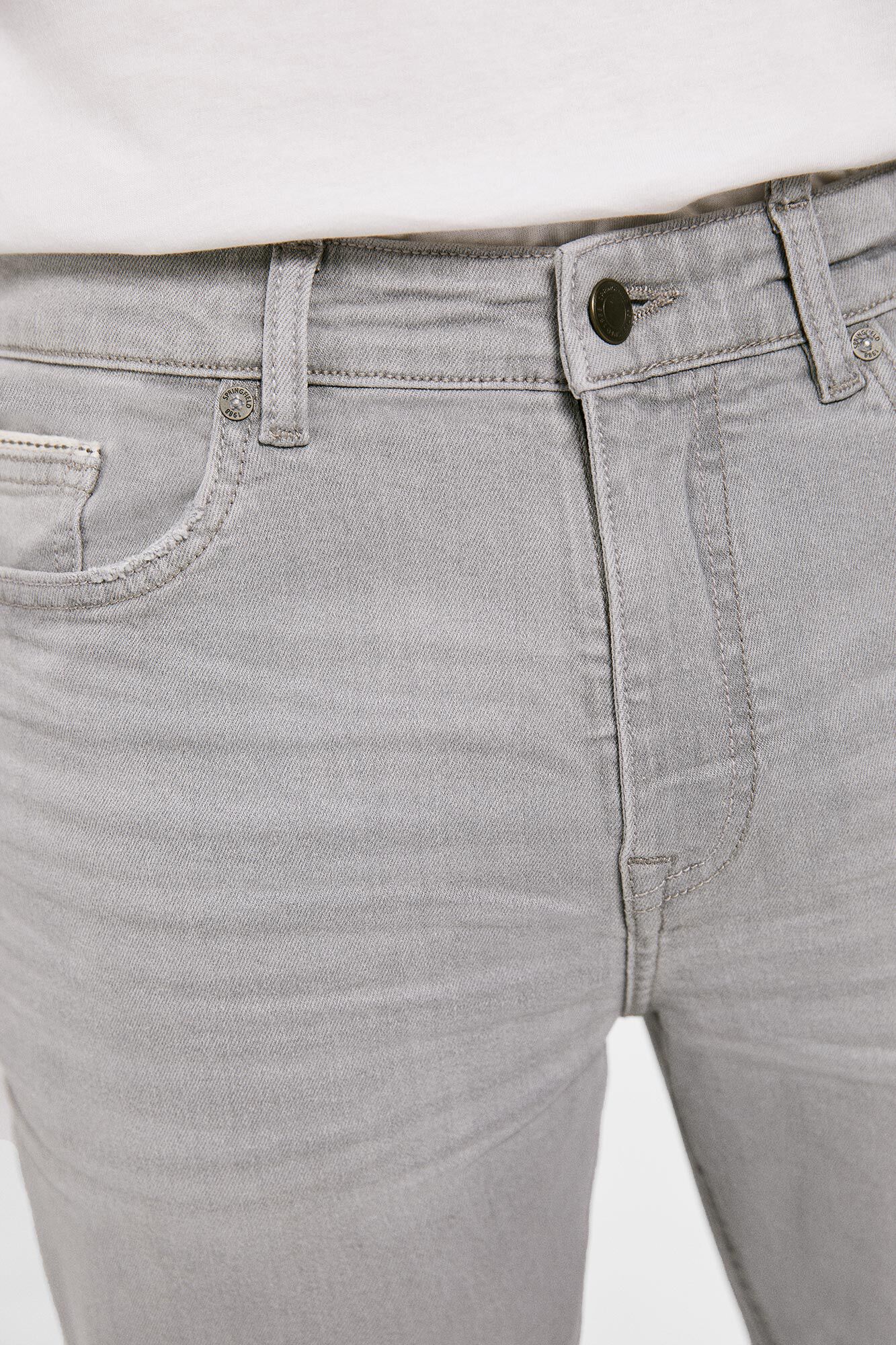 Lightweight distressed dark wash slim fit jeans