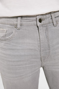 Lightweight distressed dark wash slim fit jeans