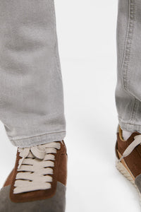 Lightweight distressed dark wash slim fit jeans